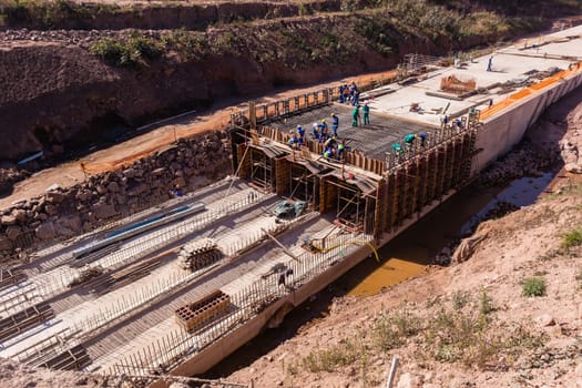 Constructionindustrial building of new road highway rain flooding water tunnels  halfway progress.
