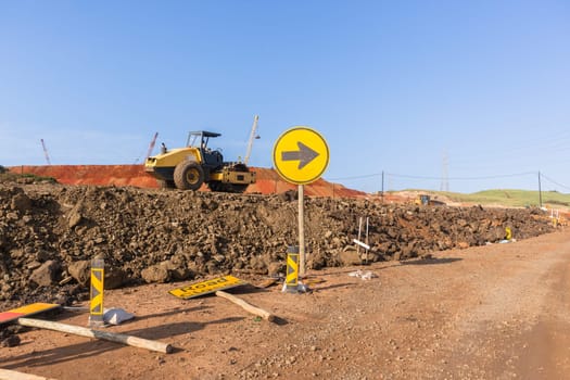 Construction industrial earthworks site  landfill grader dozer machine  leveling sand stones landscape