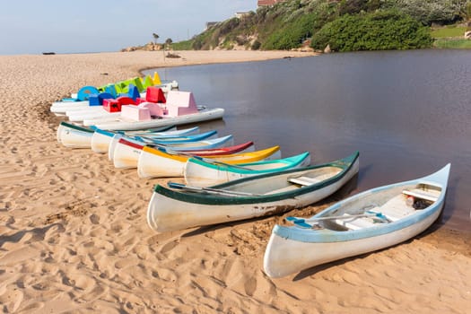 Scenic destination beach river lagoon paddle boats holiday apartments at Ramsgate South-Africa