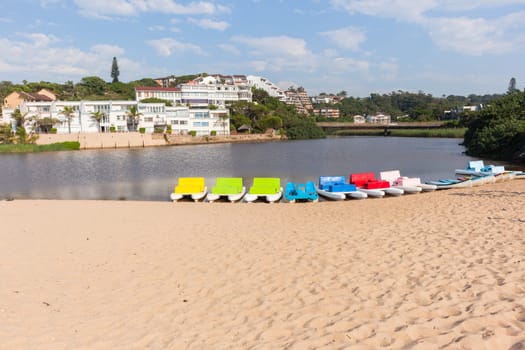 Scenic destination beach river lagoon paddle boats holiday apartments at Ramsgate South-Africa