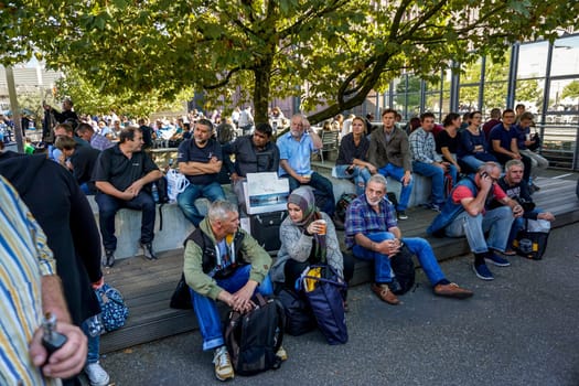 COLOGNE, GERMANY - SEPTEMBER 21, 2016: Photokina Exhibition interior. The Photokina is the world's largest trade fair for the photographic and imaging industries. People outdoor in the Photokina Exhibition.