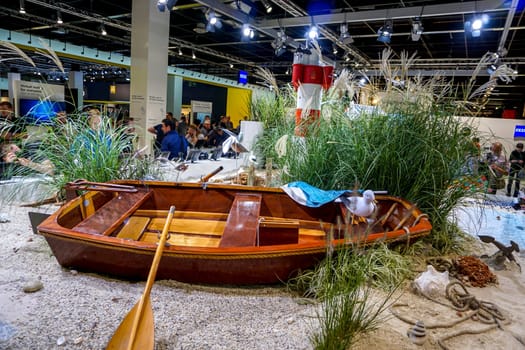COLOGNE, GERMANY - SEPTEMBER 21, 2016: Photokina Exhibition interior. The Photokina is the world's largest trade fair for the photographic and imaging industries. Zeiss stand in the Photokina Exhibition.
