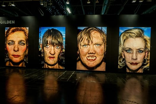 COLOGNE, GERMANY - SEPTEMBER 22, 2016: Photokina Exhibition interior. The Photokina is the world's largest trade fair for the photographic and imaging industries. Bruce Gilden portraits exhibition in the Photokina.