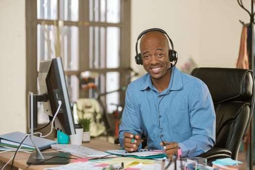 Handsome professional man wearing a headset