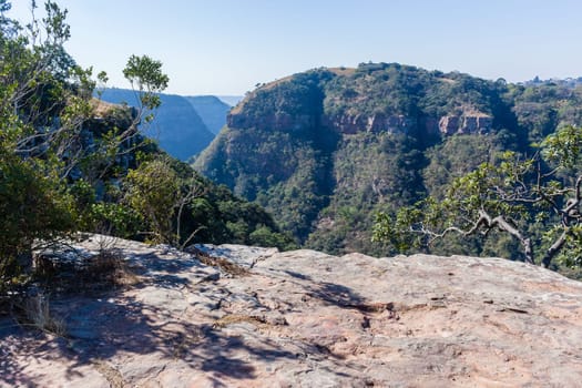 Kloof gorge overlooking rocky cliffs valley hills countryside hiking climbing landscape.