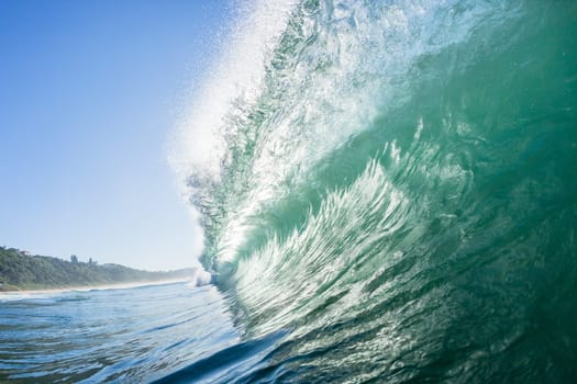 Ocean swimming closeup encounter water photo inside hollow crashing wave.