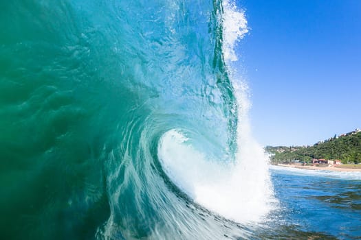 Ocean swimming closeup encounter water photo inside hollow crashing wave.