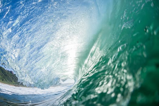 Ocean swimming closeup encounter water photo inside hollow crashing wave.