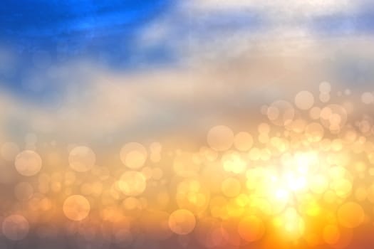 Abstract sunset illustration. Abstract evening or sunset mood background texture with mountains and orange colored bokeh lights of lit fantasy city and blue sky. Beautiful sunset.