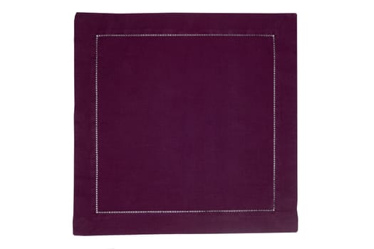 Closeup of a violet napkin or tablecloth isolated on white background. Kitchen accessories.