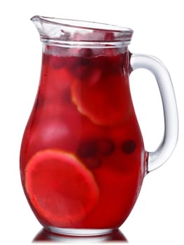Glass jug or pitcher of iced cranberry lemon drink, isolated