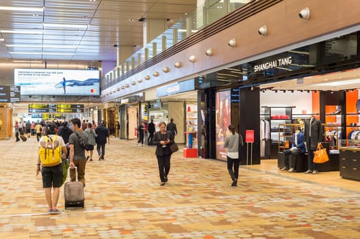 SINGAPORE - JANUARY 13, 2017 : Modern interior of Changi International Airport in Singapore. Changi Airport serves more than 100 airlines operating 6,100 weekly flights