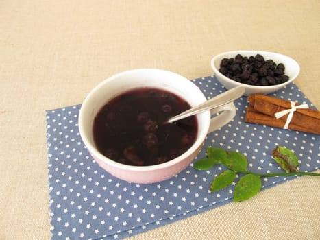 Warm blueberry soup from dried blueberries with cinnamon