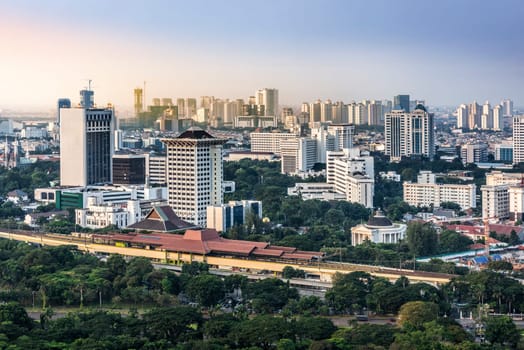 Jakarta city skyline with urban skyscrapers in the afternoon. Jakarta, Indonesia