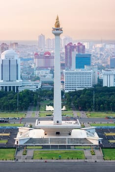 Jakarta city skyline with iconic symbol likes National Monument (Monas) in the afternoon. Jakarta, Indonesia