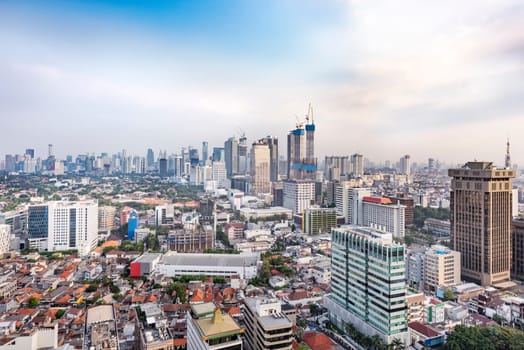 Jakarta city skyline with urban skyscrapers in the afternoon. Jakarta, Indonesia