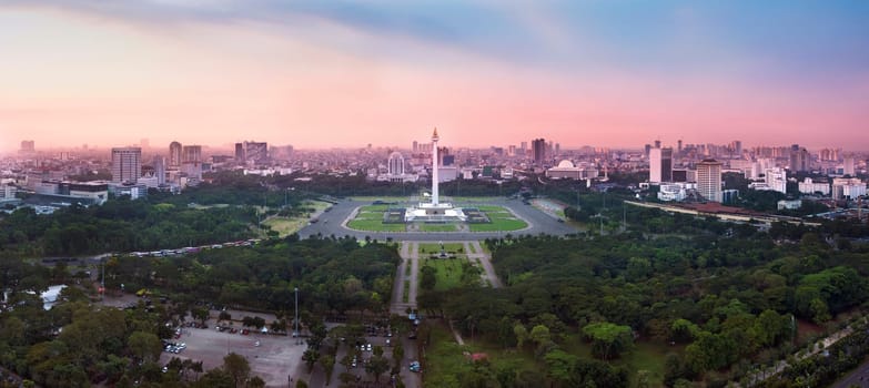 Panoramic Jakarta skyline with iconic symbol likes National Monument (Monas) in the afternoon. Jakarta, Indonesia