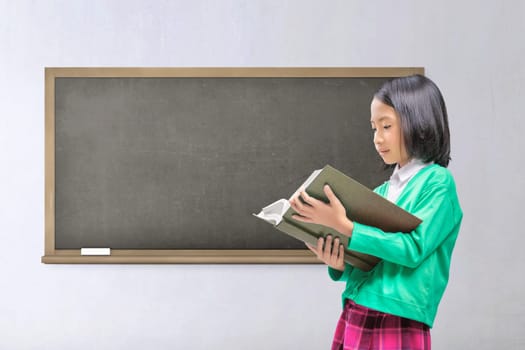 Young asian kid reading book with class background