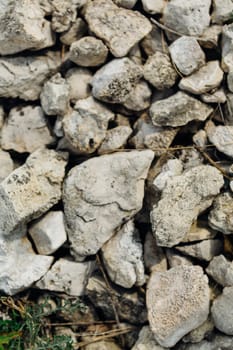 dark detailed grey stone background close up.