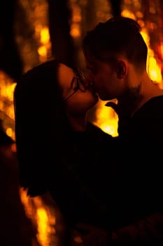 Girl and boyfriend on light sunshine background.