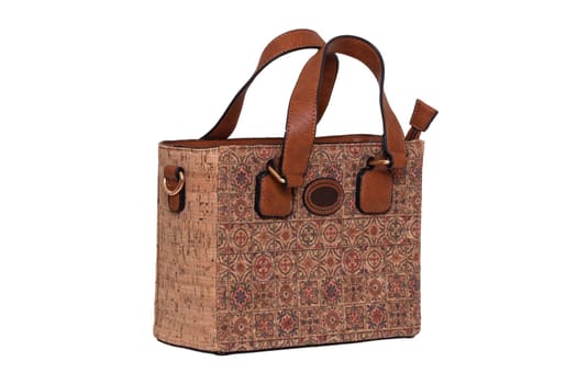 Hand bag isolated. Fashionable brown female luxury women bag  made from oak cork isolated on a white background. Womans accessories.