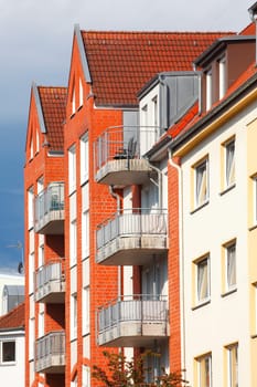 Modern residential buildings, red roofs, roof gables, roof, roof tiles, Lübeck, Schleswig-Holstein, Germany, Europe