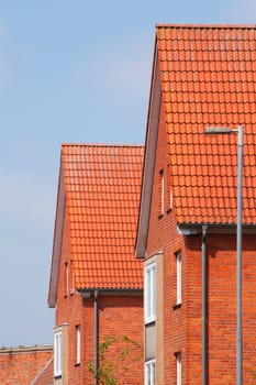 Modern residential buildings, red roofs, roof gables, roof, roof tiles, Lübeck, Schleswig-Holstein, Germany, Europe