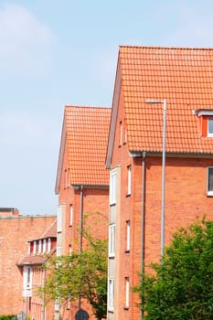 Modern residential buildings, red roofs, roof gables, roof, roof tiles, Lübeck, Schleswig-Holstein, Germany, Europe