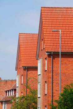 Modern residential buildings, red roofs, roof gables, roof, roof tiles, Lübeck, Schleswig-Holstein, Germany, Europe