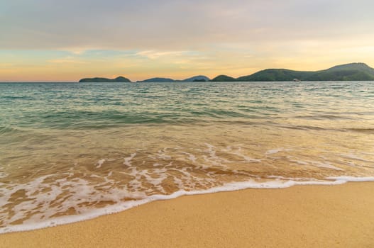 Beach sunset or sunrise with colorful of cloud sky and sunlight in evening light