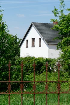 White house with garden, one-family house, residential building