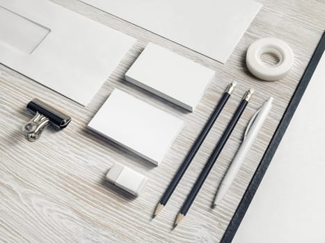 Blank corporate identity. Stationery template on light wood table background. Branding mockup.