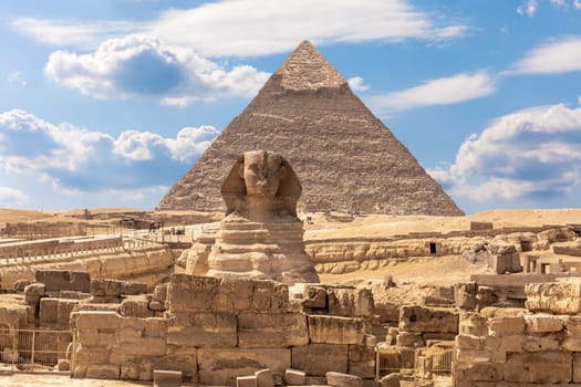 The Sphinx, the Pyramid of Chephren and the ruins of a temple in Giza, Egypt.