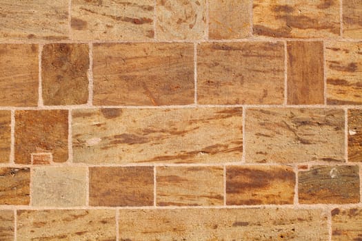 Brown sandstone wall, sandstone cube, background, Germany