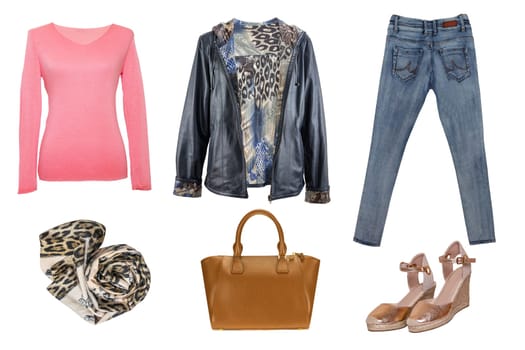 Collage woman clothes. Set of stylish and trendy women jacket, sweater or blouse, jeans, shoes and accessories isolated on a white background. Latest fashion trends.
