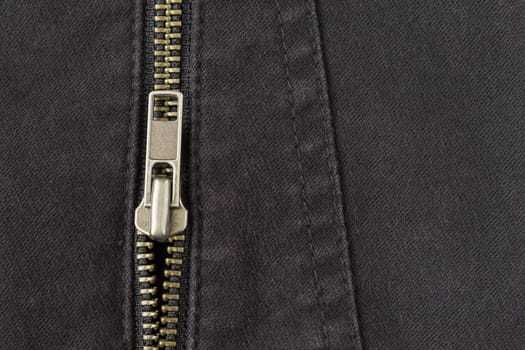 Open Brass Zip on Black Jeans Texture Background. Open Brass Zip on Black Jeans Texture Background for Apparel Design