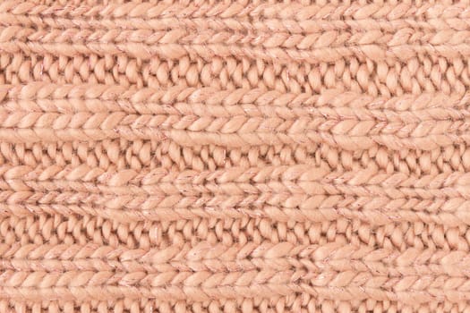 Brown Knitting Texture or Knitted Texture Background in macro style. Knitting Texture or Knitted Texture in vintage style for design