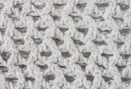 White Knitting Texture or Knitted Texture Background in macro style. Knitting Texture or Knitted Texture in vintage style for design