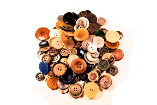 A moltitude of different buttons on a white background
