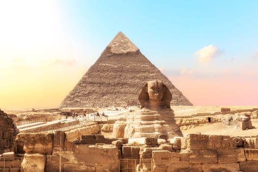 Ruins of the temple of Giza with the Sphinx and the Pyramid of Khafre,  Egypt.