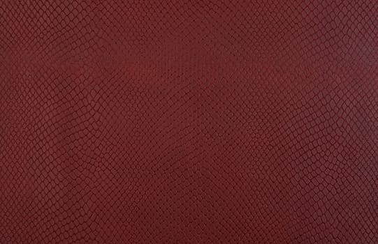 Brown embossed imitation snake skin background