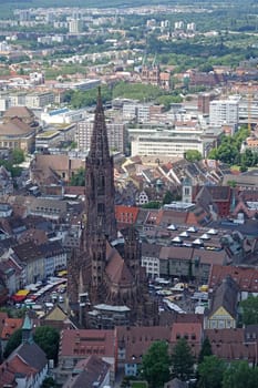 The old town of Freiburg with cathedral and market on the cathedral square
