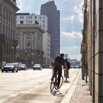 Road traffic on Leipziger Straße in Berlin during rush hour on a summer day