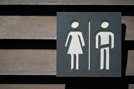 Symbols for man and woman in a public toilet