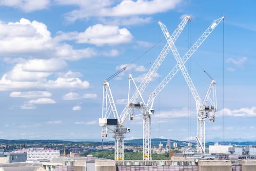 Construction crane working in construction site