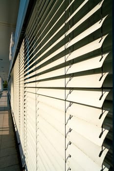 Venetian blind as a sunscreen on the window of an office building in Berlin
