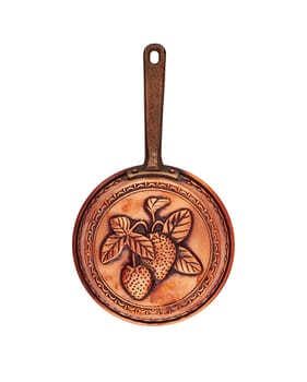 Vintage copper pan with a handle for baking engraved with strawberries isolated