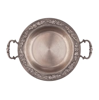 Round zinc plate with handles isolated top view