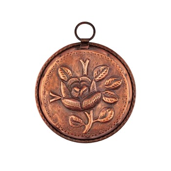 Vintage copper baking dish with rose flower pattern isolated top view