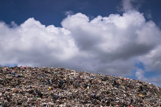 Landfill With Cumulus Clouds, landscape with garbage dump